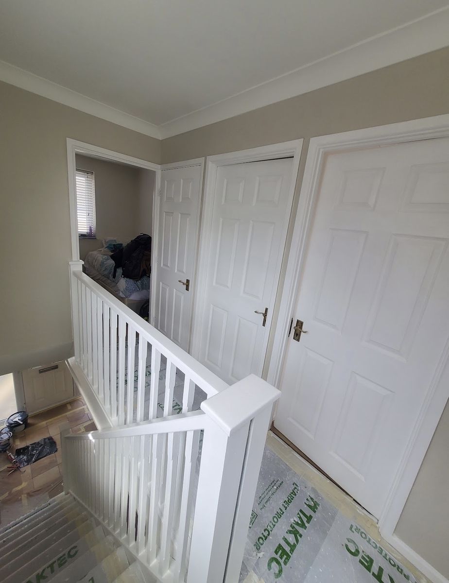 Landing and doors finished in white
